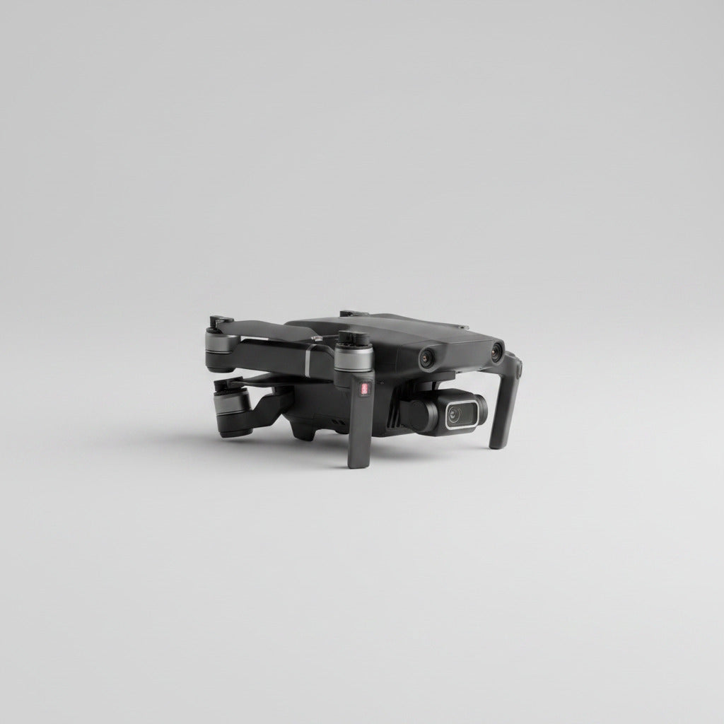 Black drone with text highlighting features on a dark background