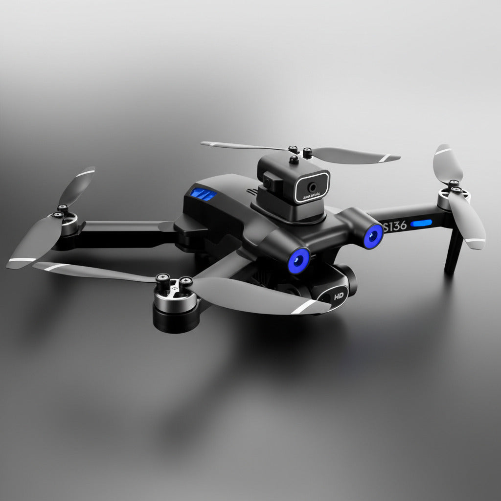 Black drone with propellers on a gray background