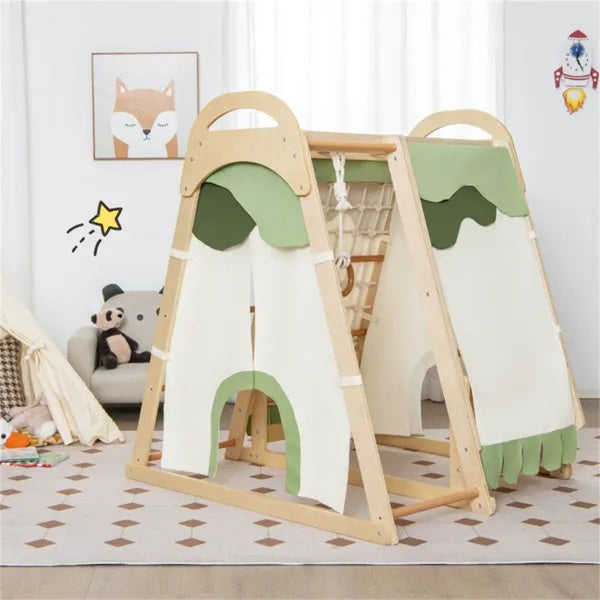 Children's play area with a wooden climbing frame, slide, and swing set in a room.