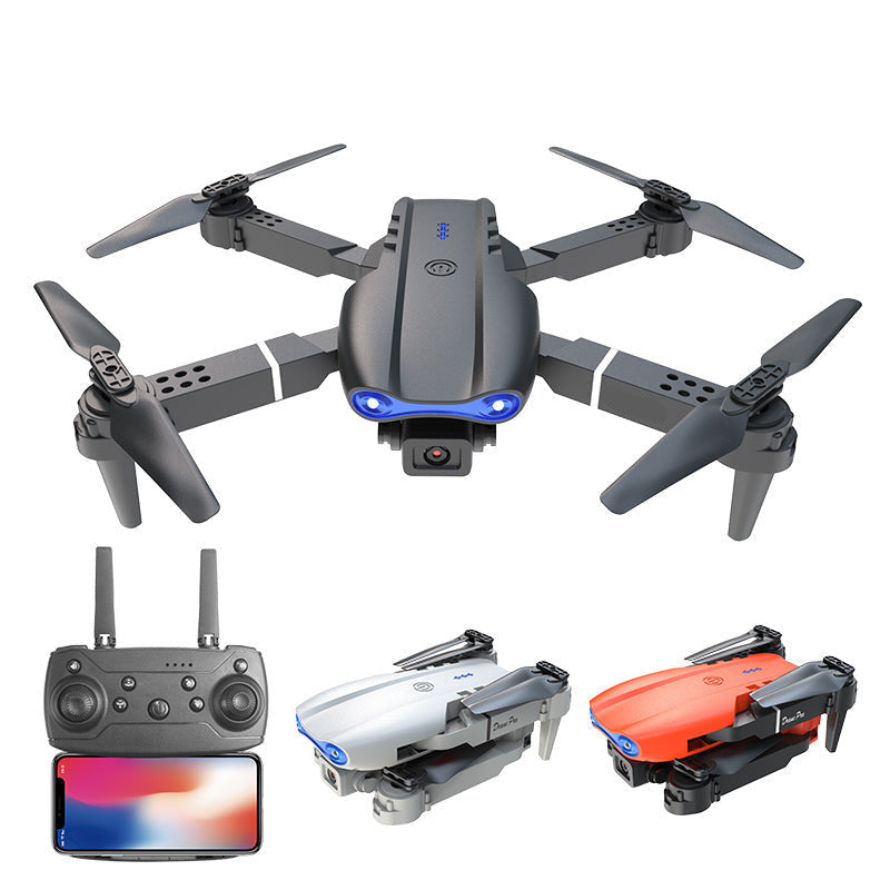 Aerial photography drone with dual camera, remote control, and folded drone on a white background